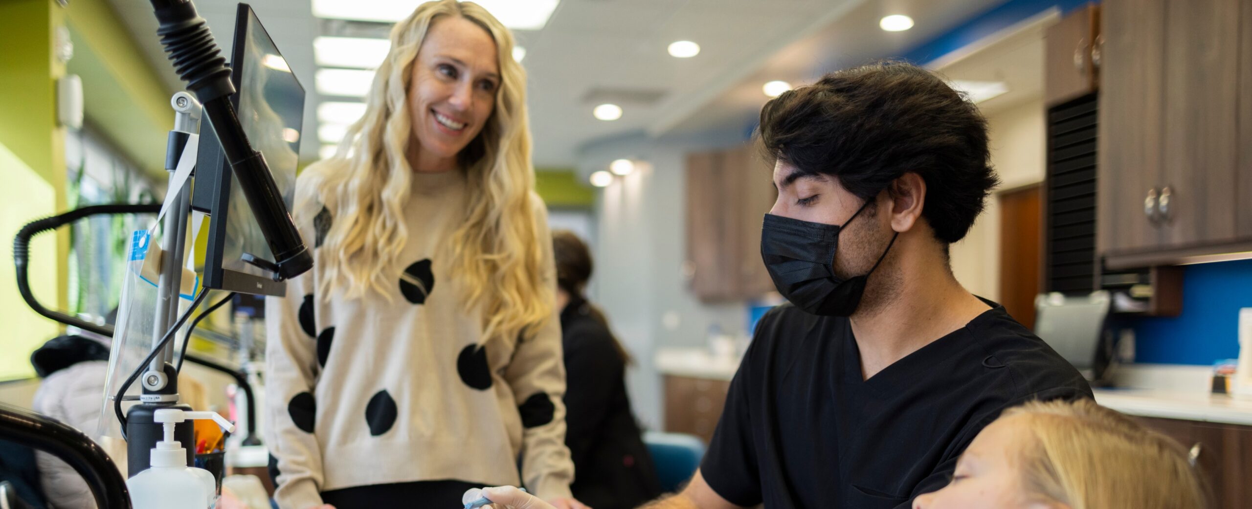 Team member treating patient